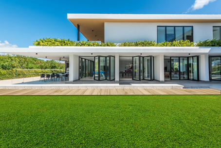 A large house with bifold windows and doors