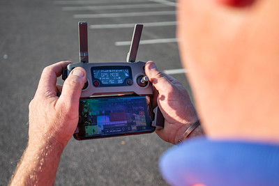 A man using a drone controller