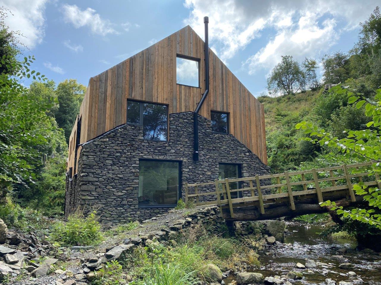 Converted Milll nestled in a valley in Cumbria