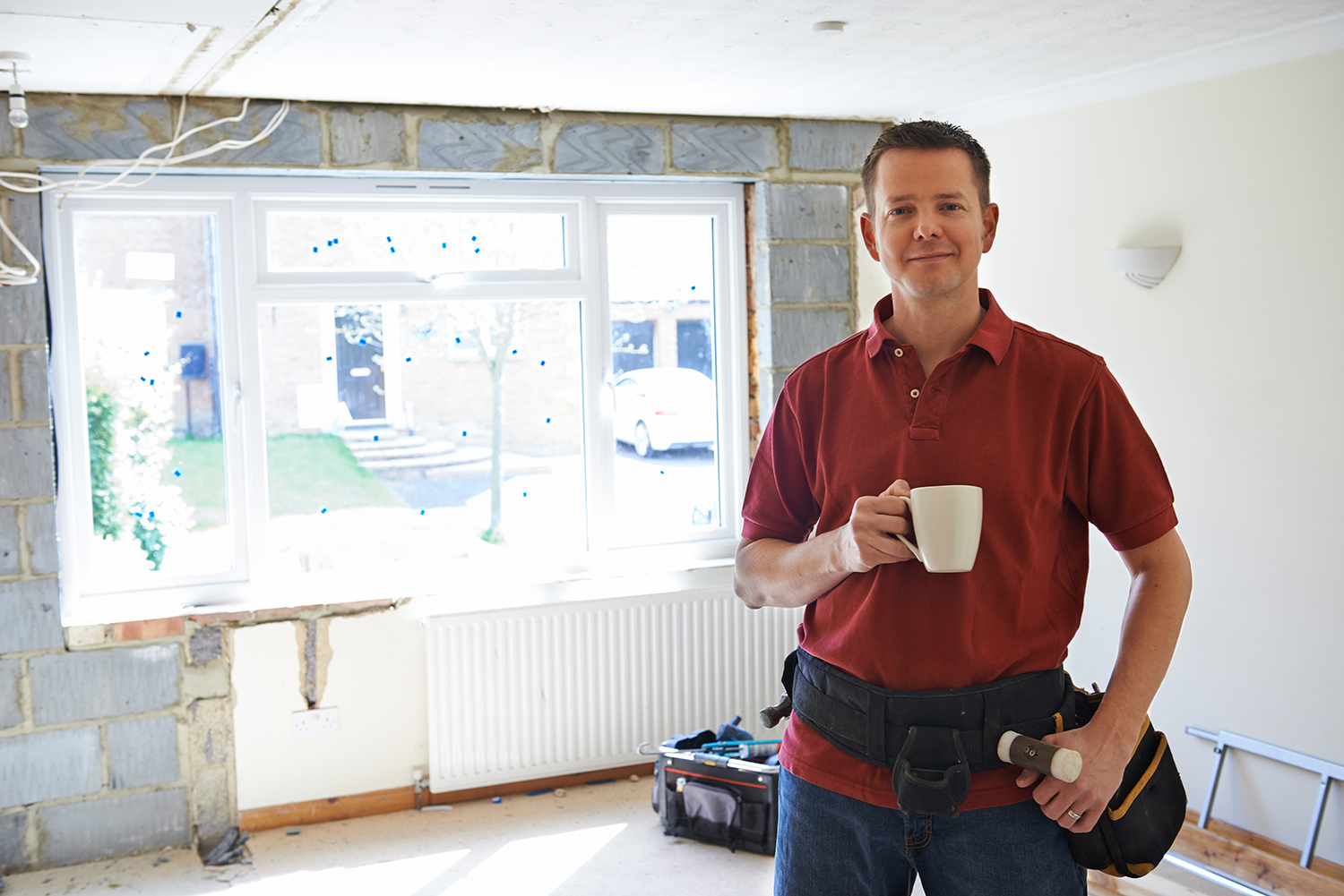 A window installer drinking tea