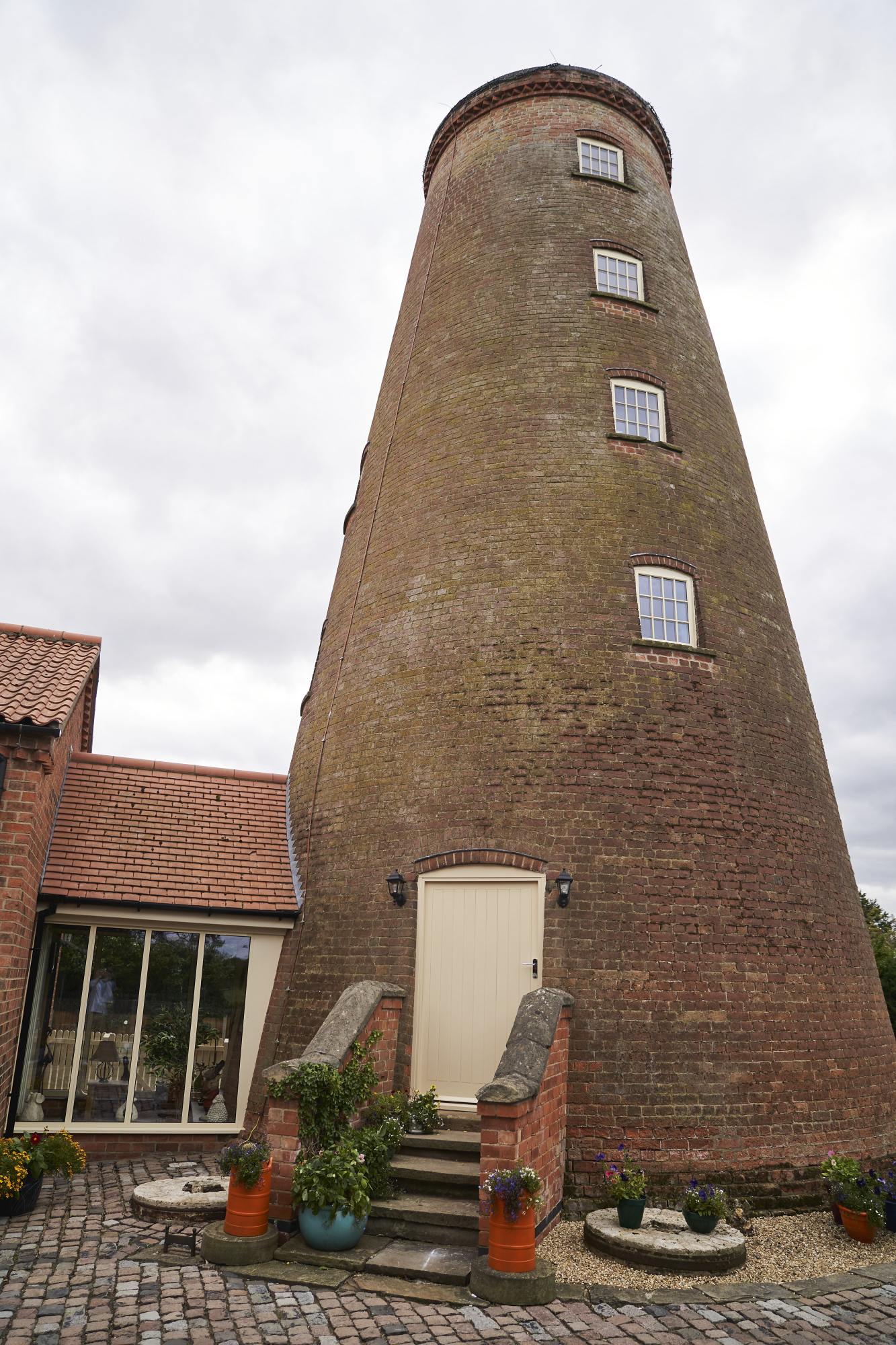 AluK windows and doors in the Grade II windmill restoration