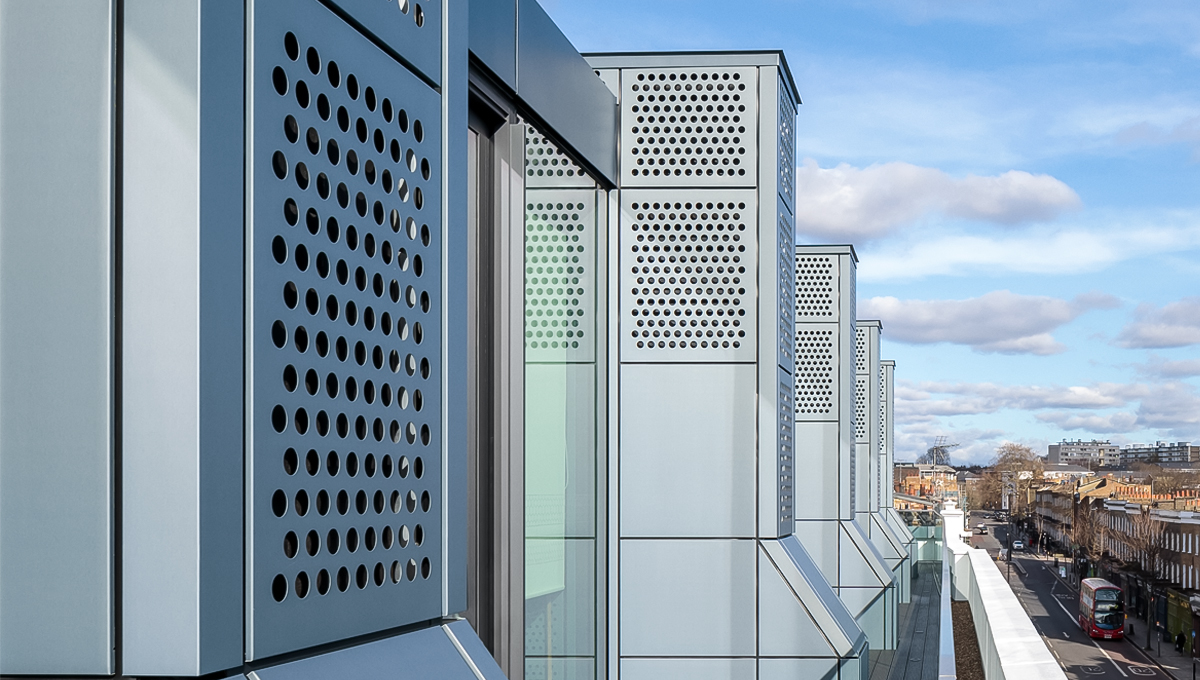 The aluminium cladding on the ventilation stacks and other views of the new Institute of Physics building in London's Kings Cross.v