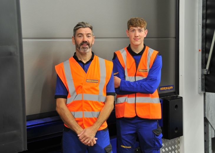 2 men in high vis clothing