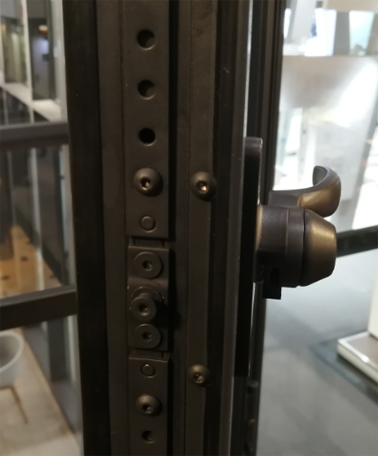 Multi point lock for a steel window