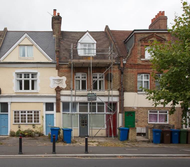 A terraced house with scaffolding