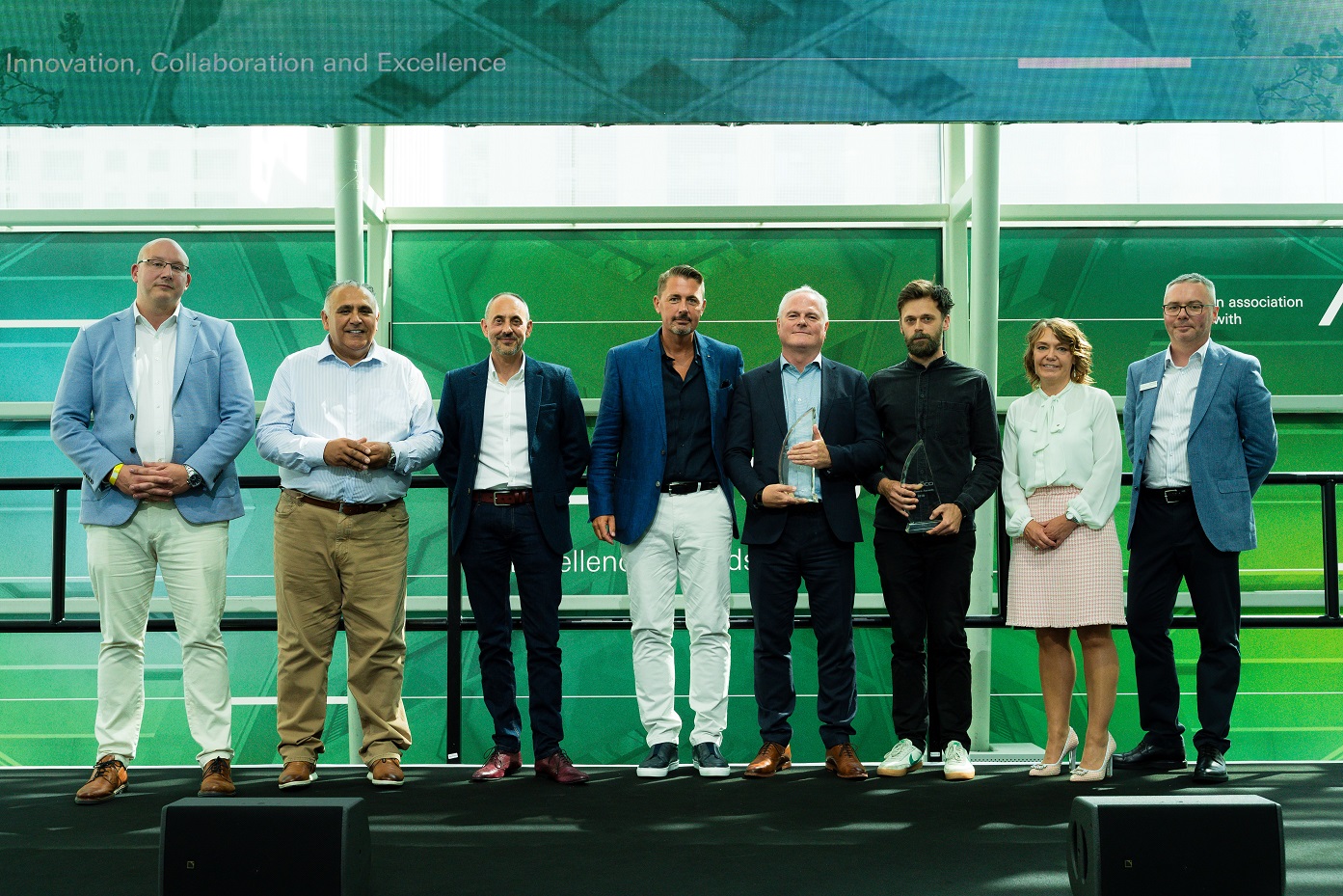 Those involved in the winning project collect their Schüco Excellence Award