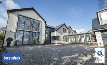 The outside of a house with nice windows