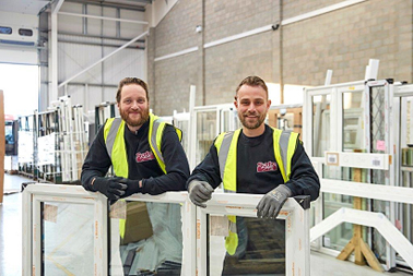 2 men in high vis jackets