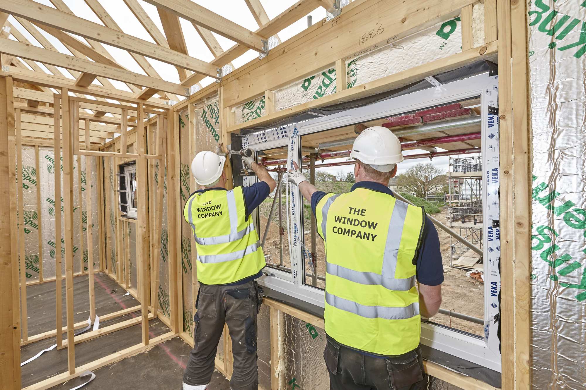 Windows being fitted on a building site